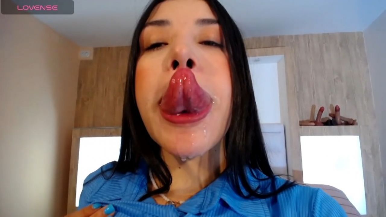 Naughty Girl Slides Her Tongue along Dildo before Pleasuring