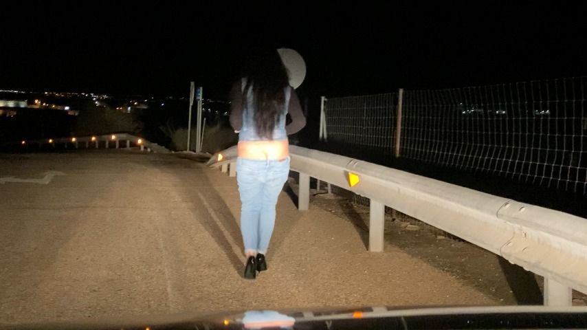 buttcrack in jeans on the road at night