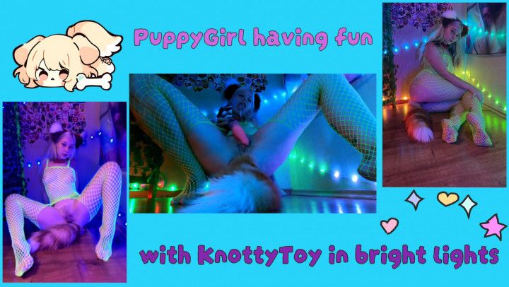 PuppyGirl having fun whis KnottyDildo in bright lights