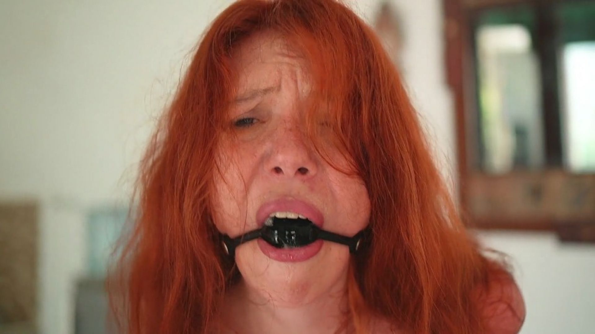 Redhead ballgagged sexy girl drooling in duct tape bondage