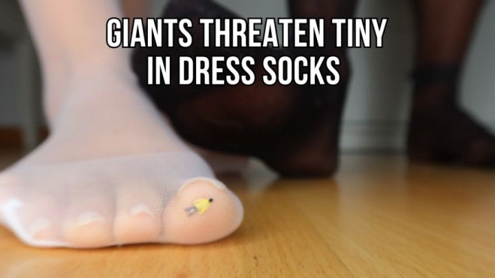 Giants in dress socks threaten tiny - Lalo Cortez and Vaness