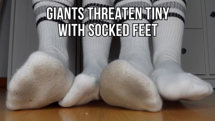 Giants threaten tiny with socked feet white cotton socks