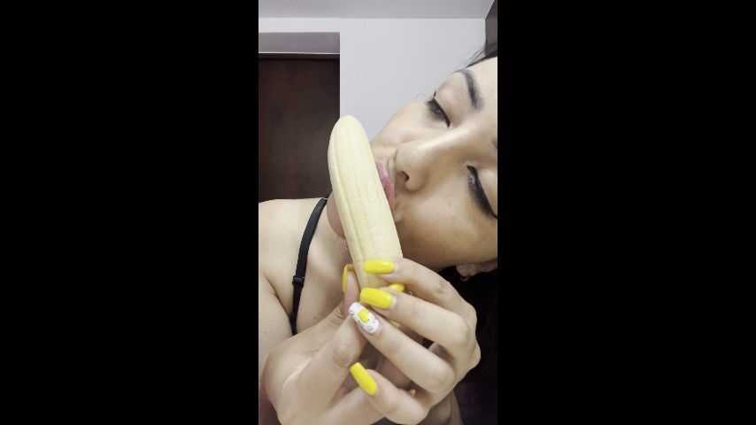 Sucking on a banana, and putting all in my mouth