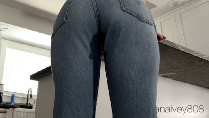 Pissing in Jeans Talking on Phone