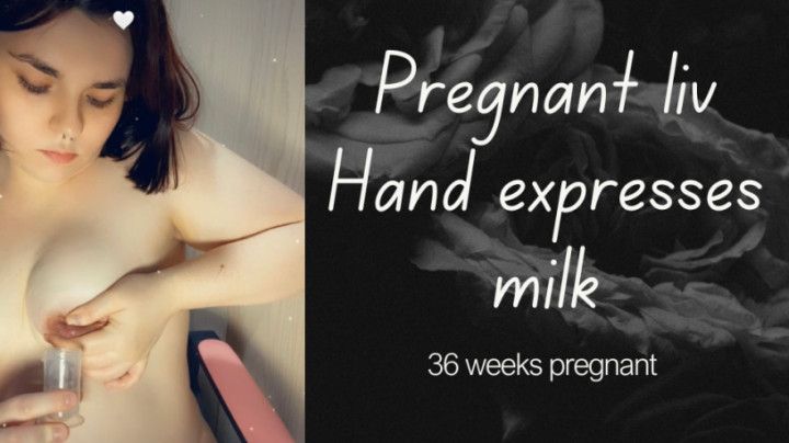 Pregnant liv hand expresses milk