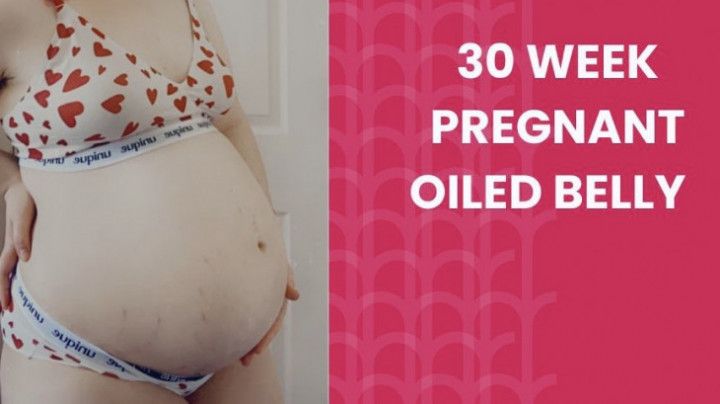 30 weeks pregnant oiled belly