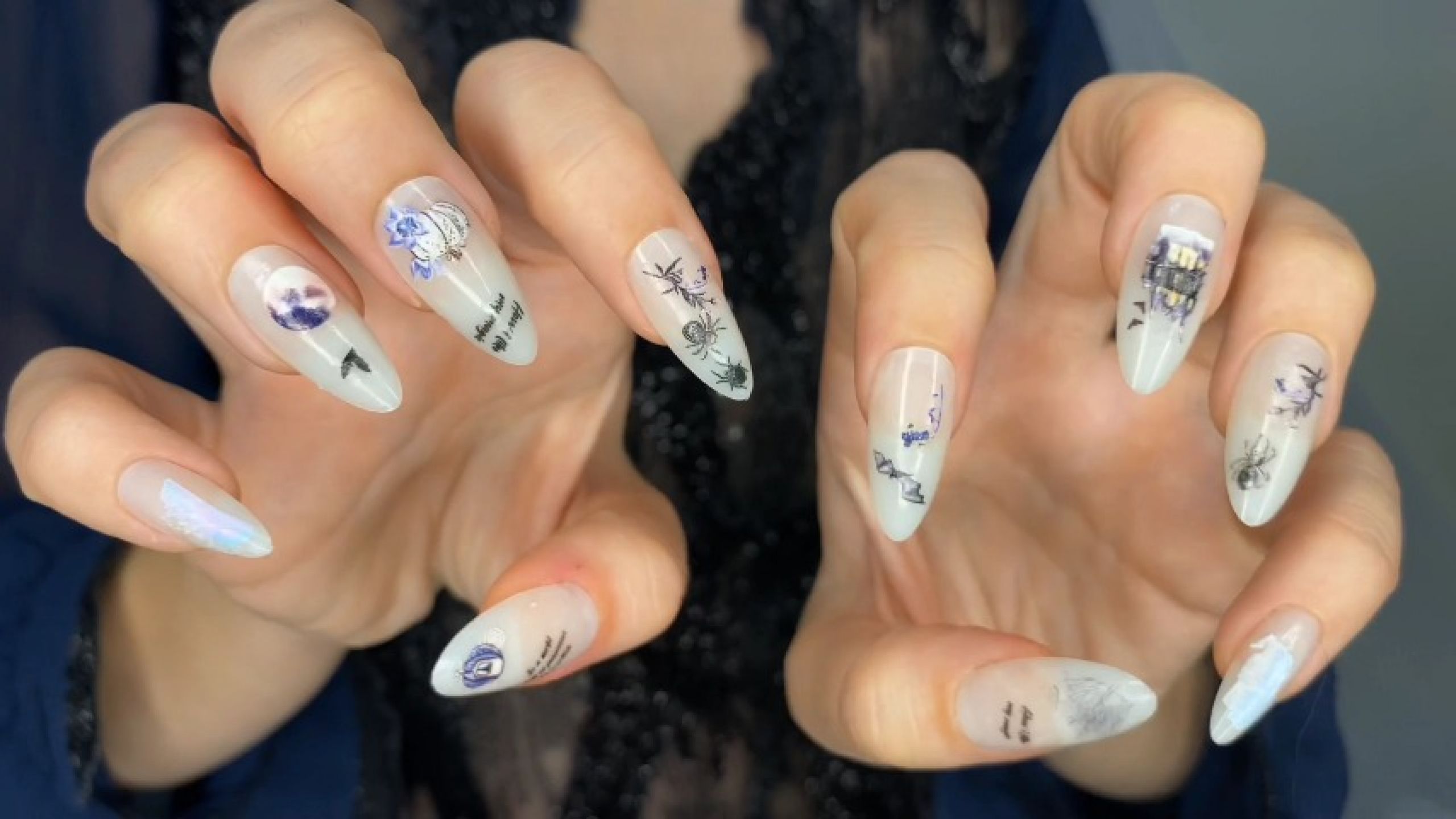 Halloween nail decor on elegant fingers