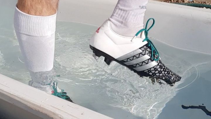 SOAKING WHITE SOCCER SUIT AND ADIDAS CLEATS