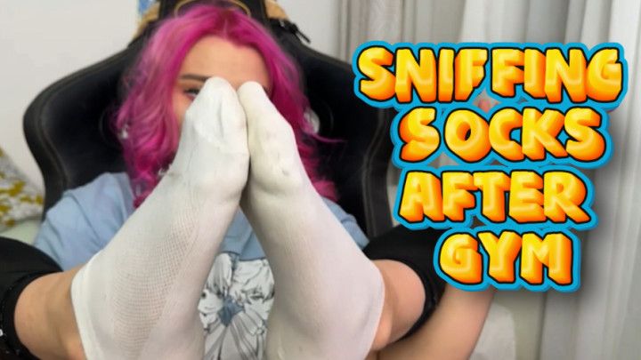 Sniffing white stinky socks after gym