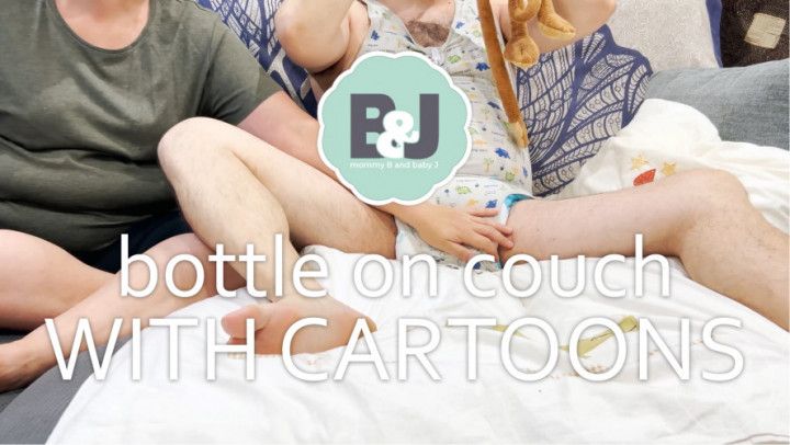 Bottle on couch with cartoons