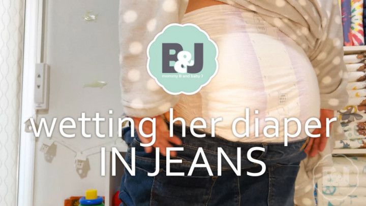 Wetting her diaper in jeans