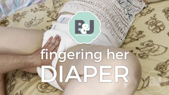 Fingering her diaper