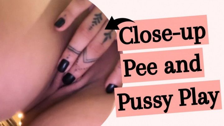 Close-up pee and pussy play