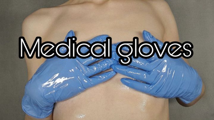 medical gloves/close-up of nipples in oil