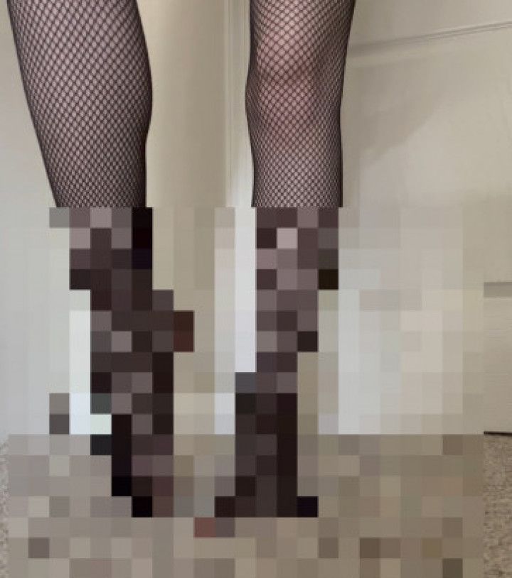 Flexing my feet in fishnets