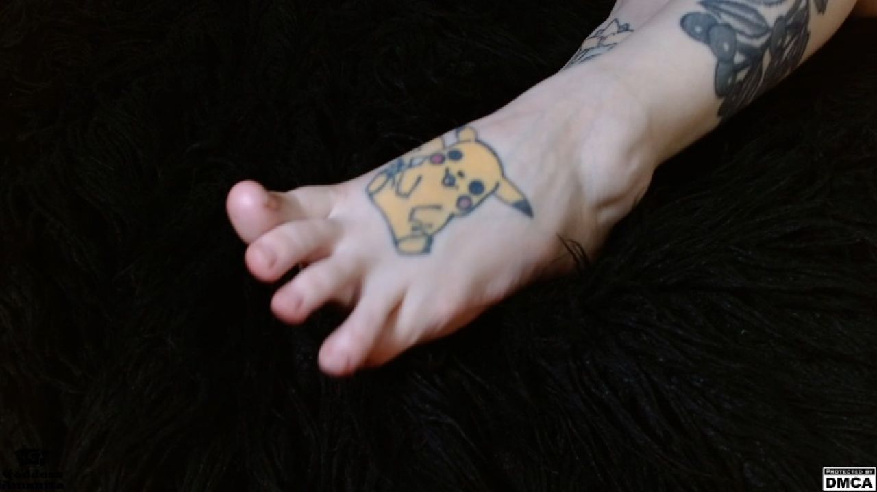 Mesmerizing feet and black fur blanket