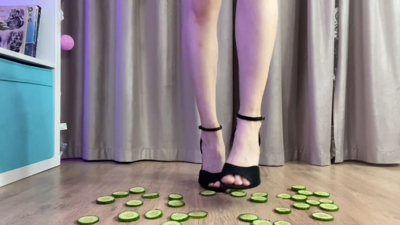 High hills stepping on cucumbers ;) mistress