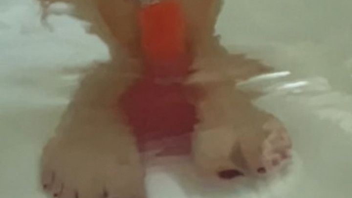 Dildo foot play in the bath tub