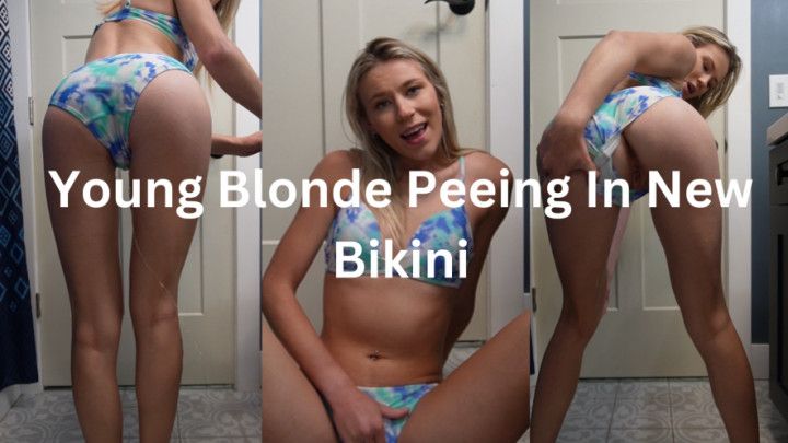 Young Blonde Peeing In New Bikini