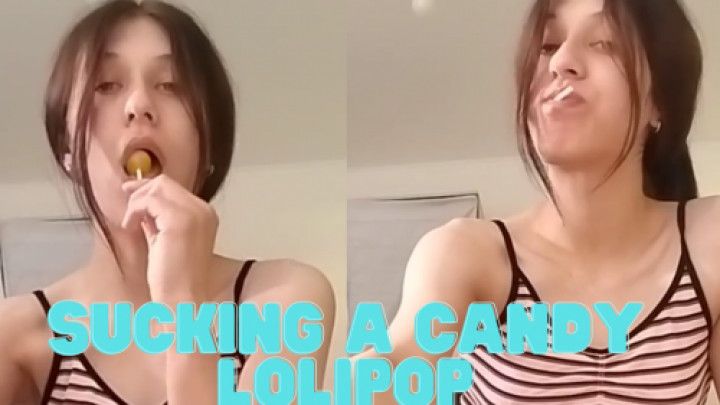 Sucking a candy lolipop