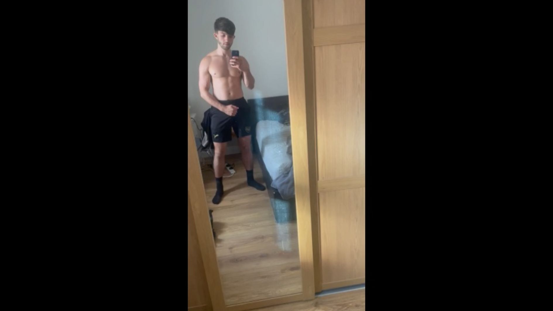 Hot guy peels off his sweaty football shorts and jerks off