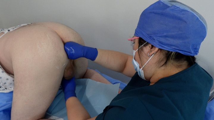 Doctor performs surgical medfet prostate milking on patient