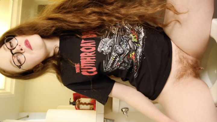 Cute Redhead in Glasses Pees In Band Tee