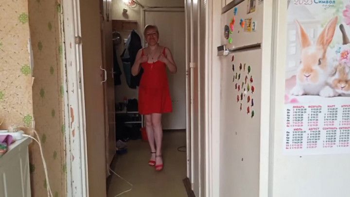 Pissing of a horny blonde in red dress