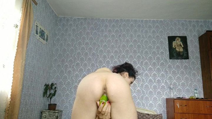 Masturbation cucumber in the pussy with condoms