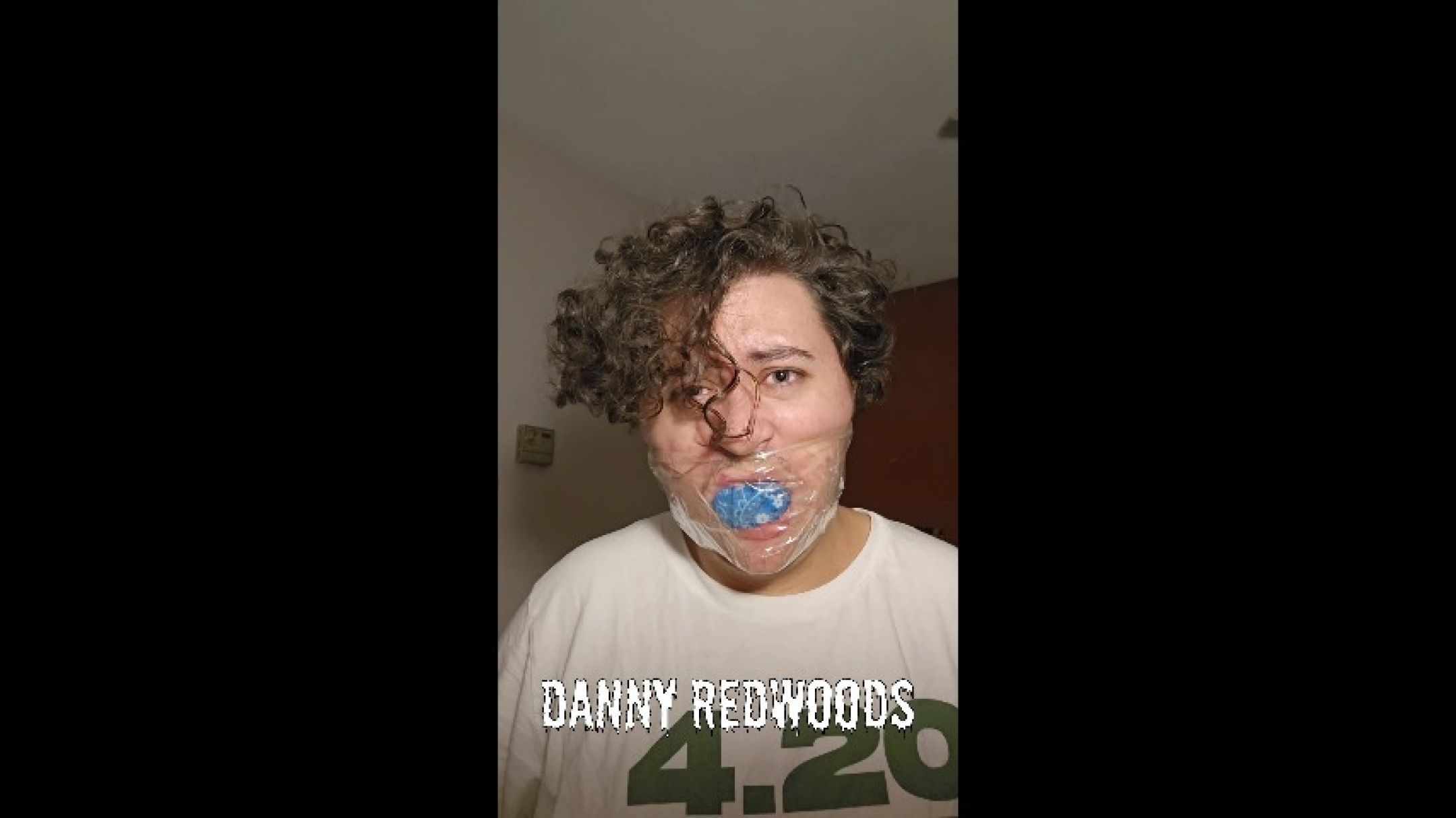 Boy in Distress Struggles in Clear Tape Bandana Gag