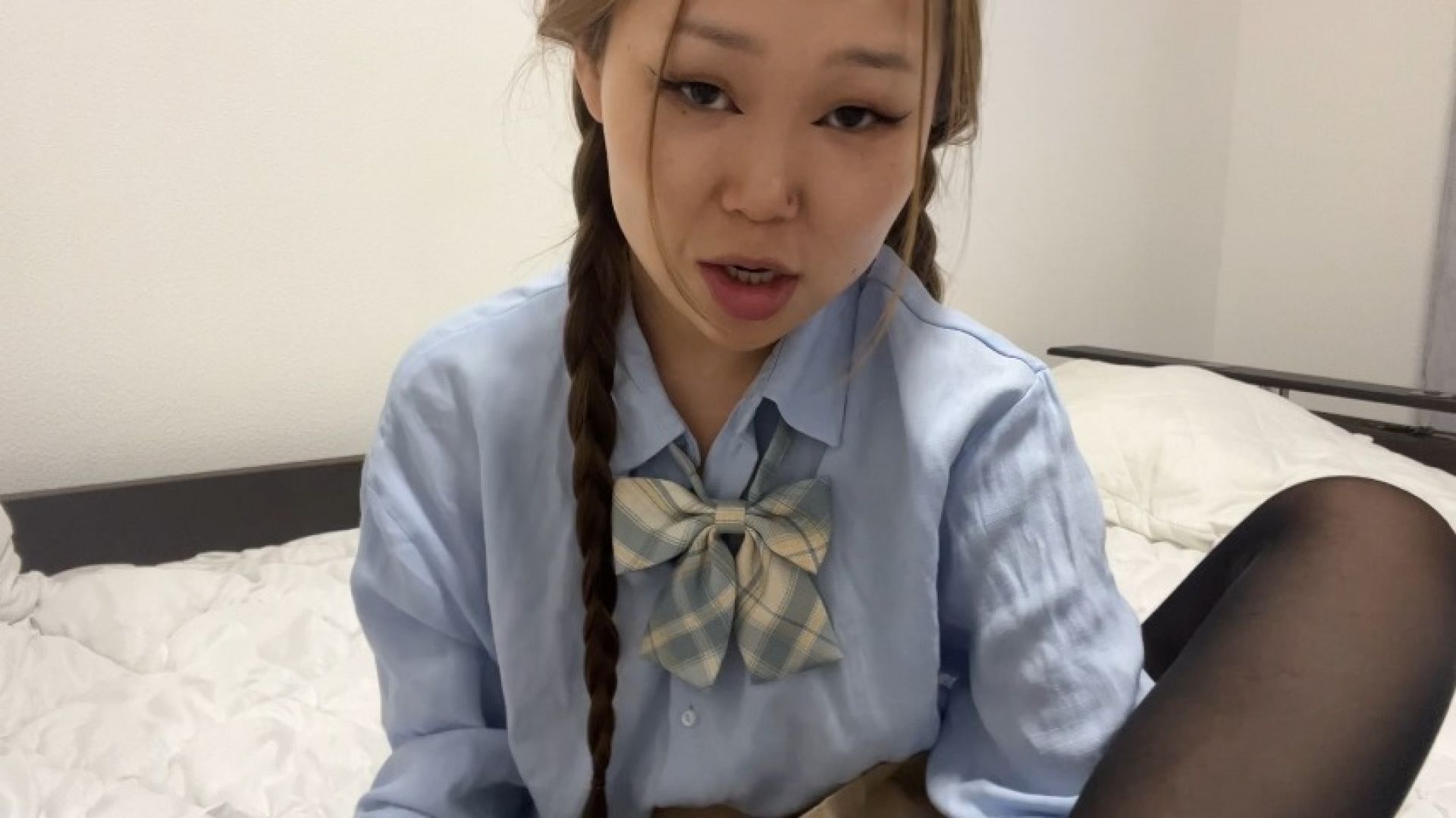 Girl in school uniform licks cum off her foots