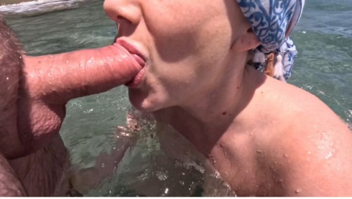 Stranger girl jerks off and blowjob in the water on public