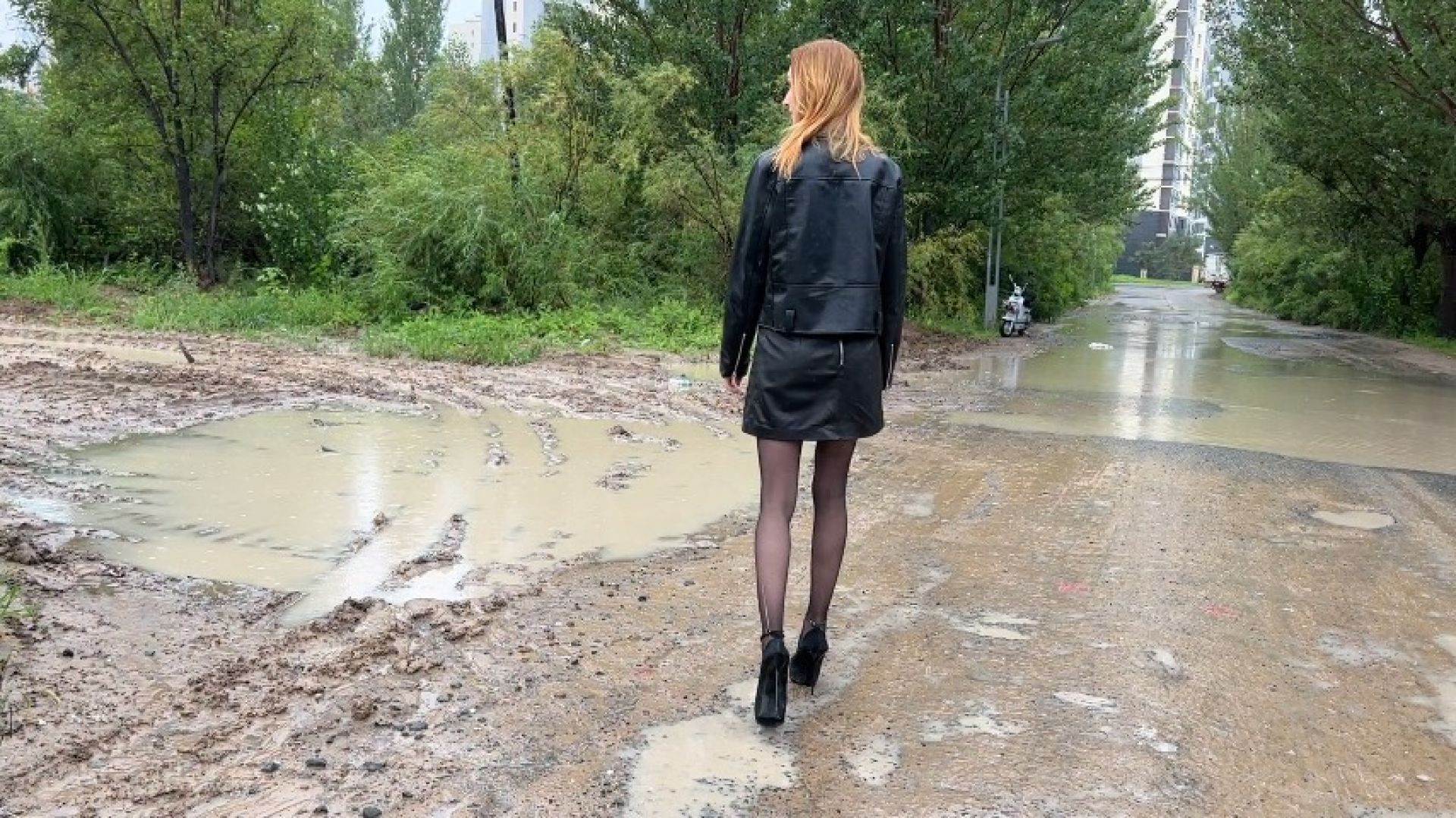 girl in high heels drowning in deep mud and tears stockings