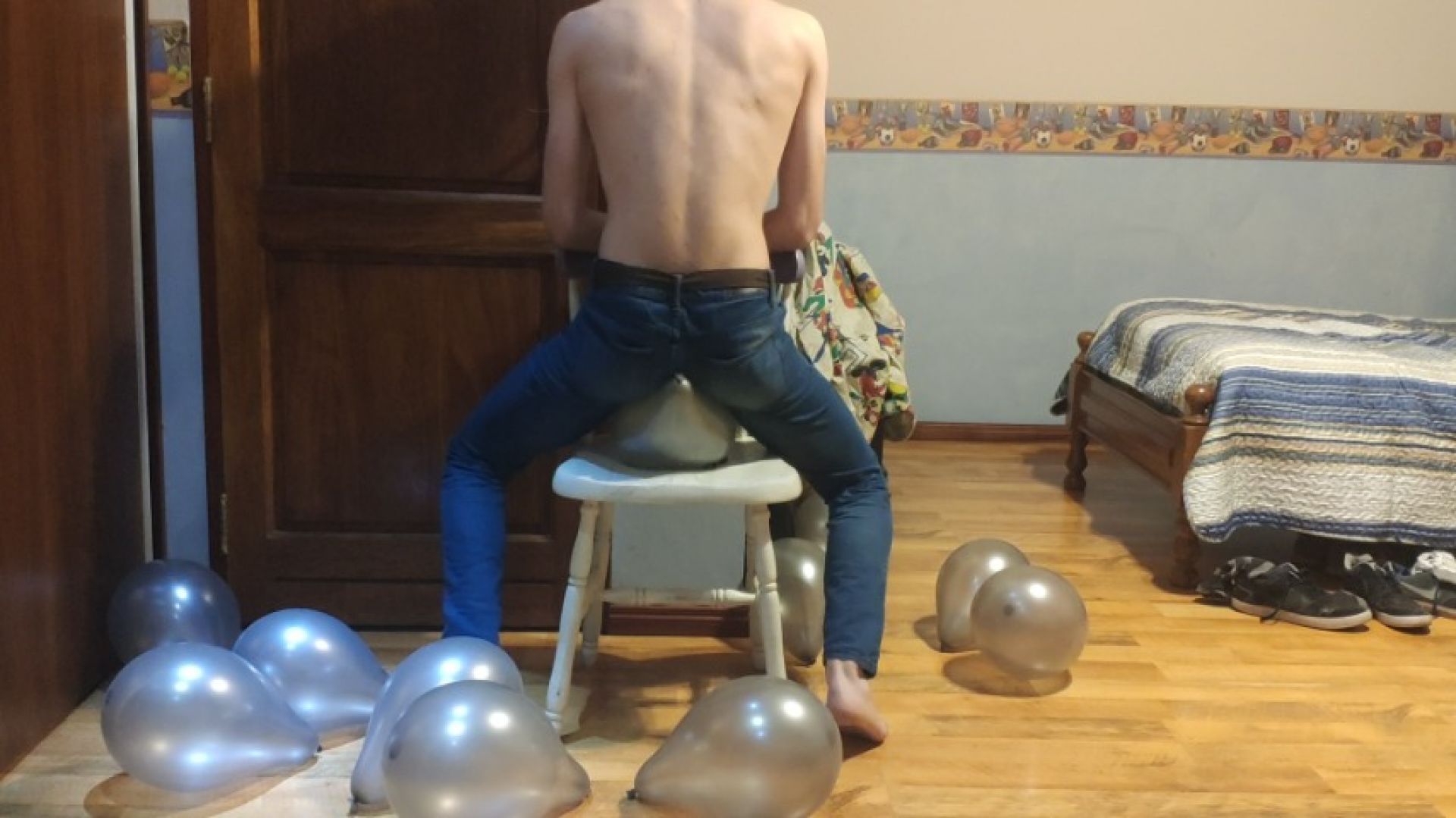 Sit To Pop A Mass of Balloons In Tight Jeans