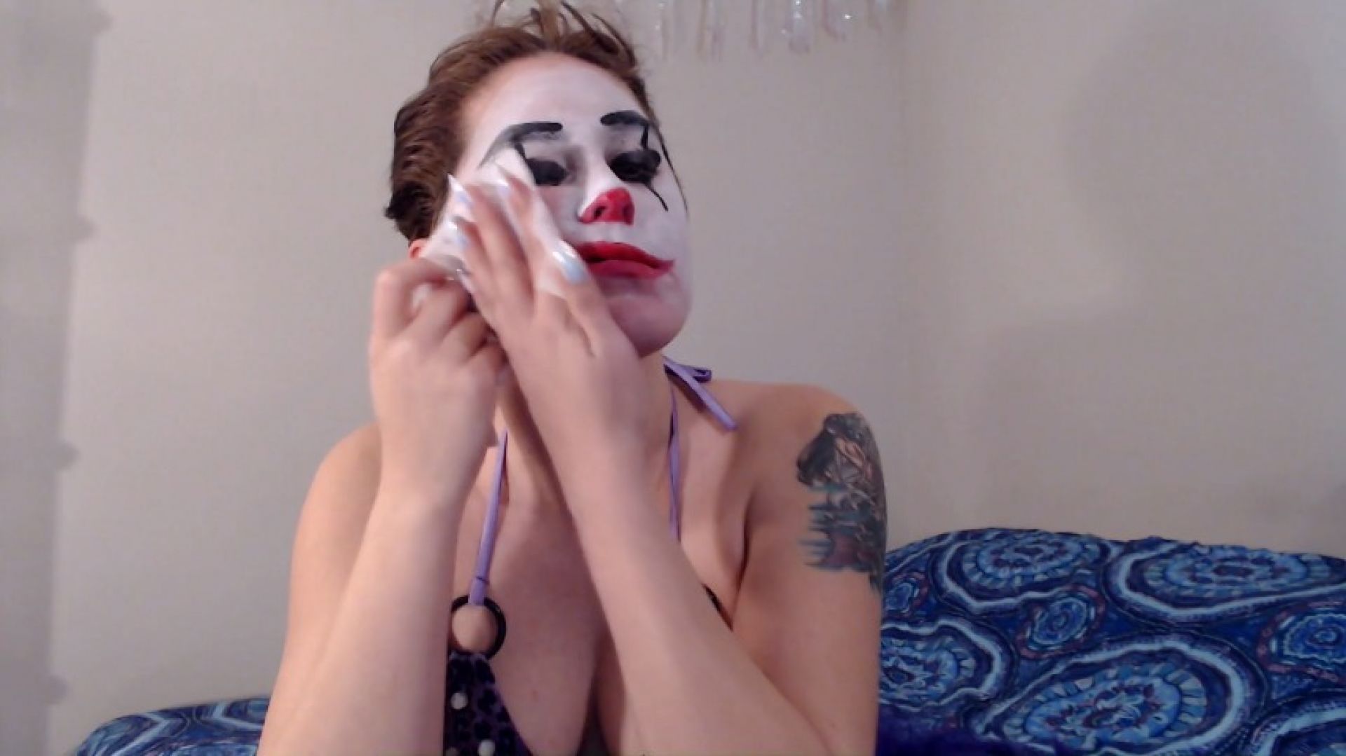 Sad clown makeup removal