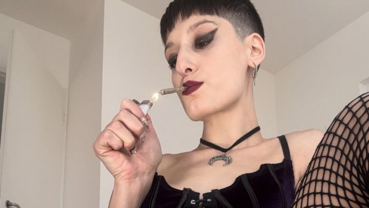 GOTH Smoking a joint in fishnets