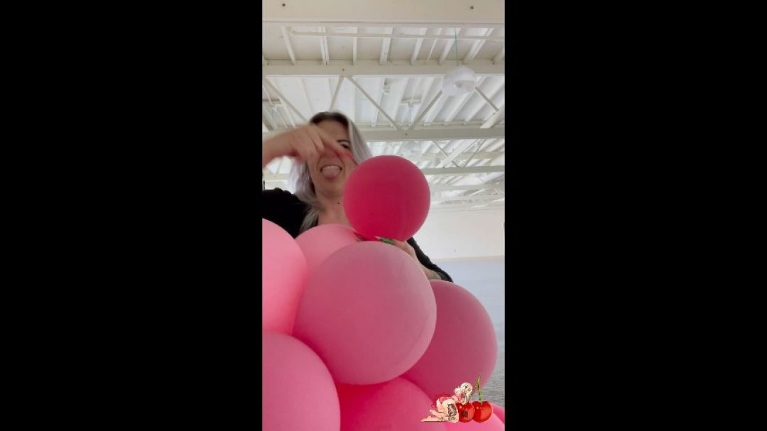 Popping balloons with my long nails