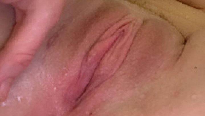 Playing with my shaved pussy in the shower