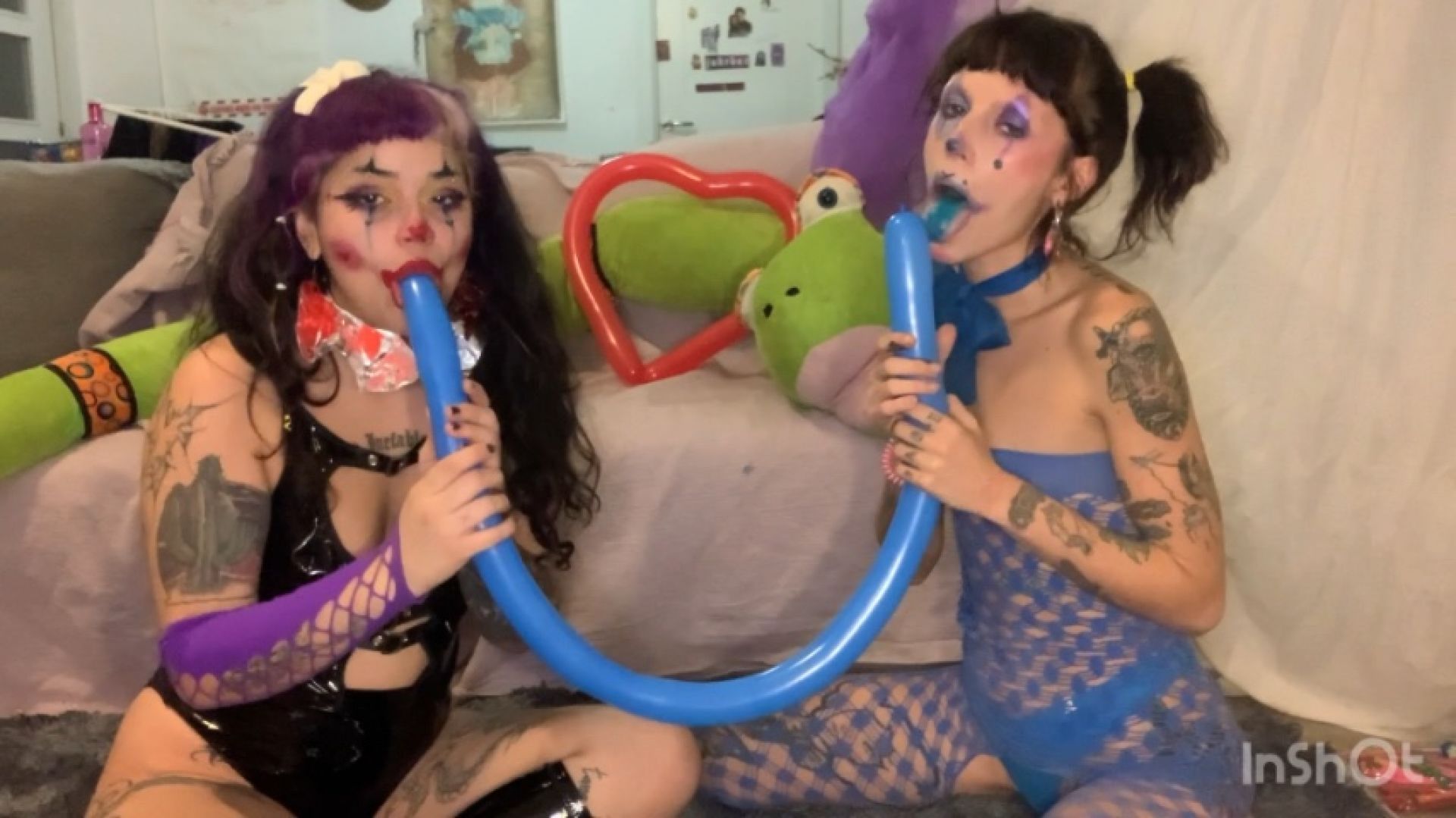 Sexy clowns sucking ballons and exploting them