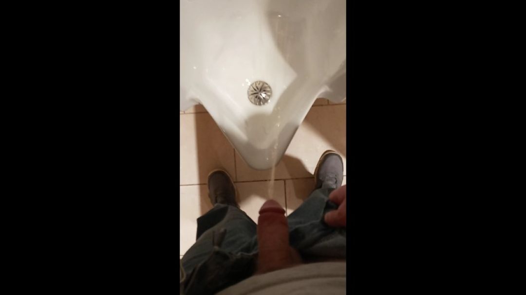 Burst pissing in college restroom