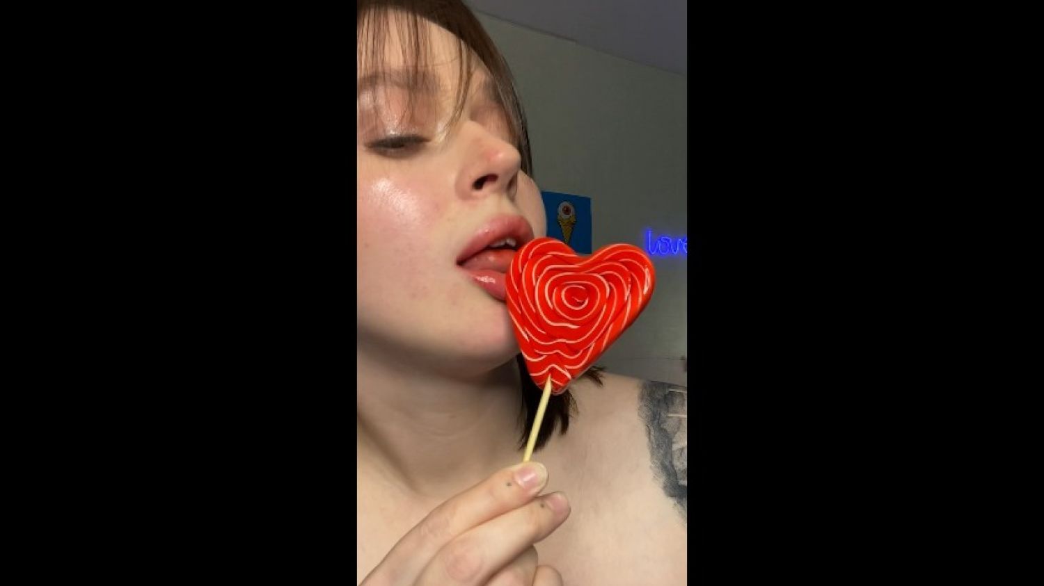 Sucking and licking lolipop