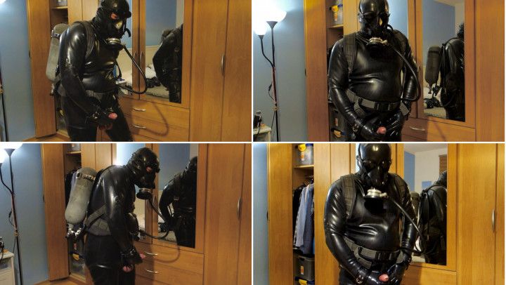 Masturbating in rubber suit with breathing apparatus