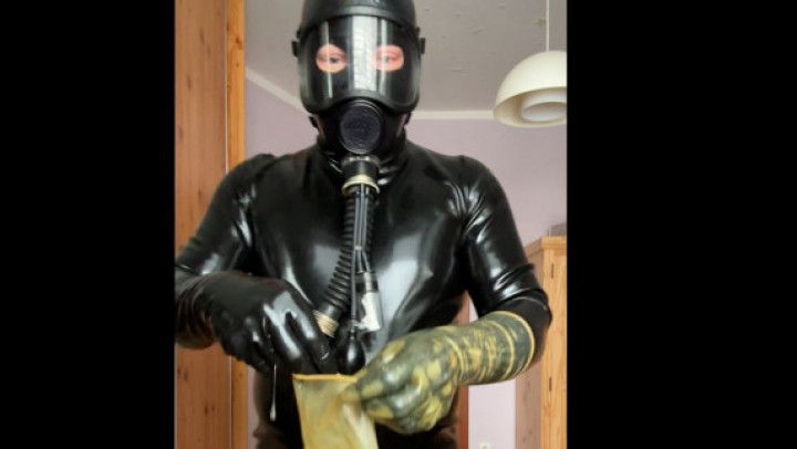 Ass playing in full rubber suit, gas mask and gloves