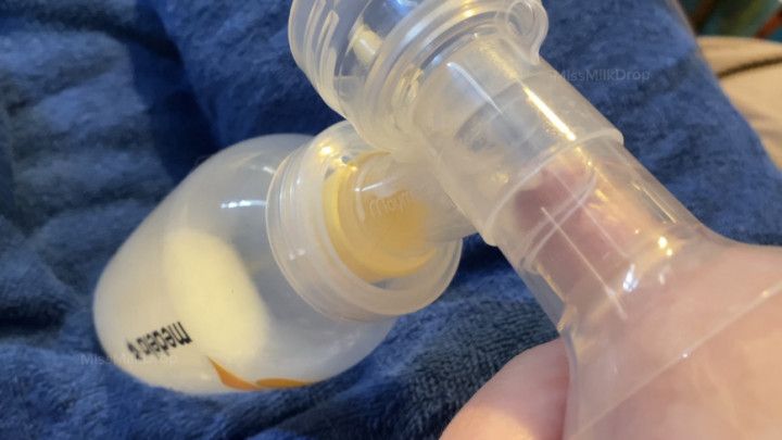 Close-up Breast Pumping with Milk Streams