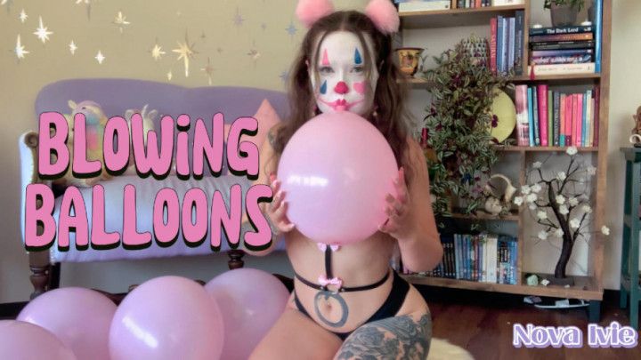 blowing balloons