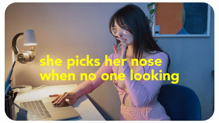 Girl with the glasses picks her nose while working