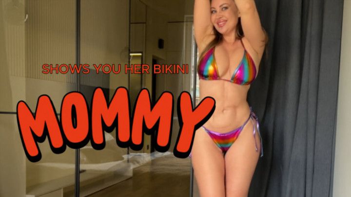 a milf dancing in a bikini