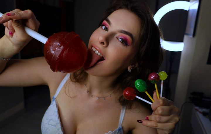 Cutie trains with different sizes of lollipop to lick suck