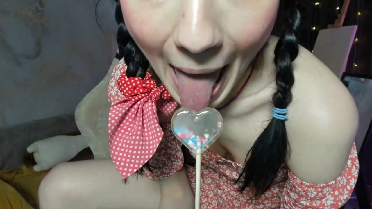 Sucking and licking Lolli Pop