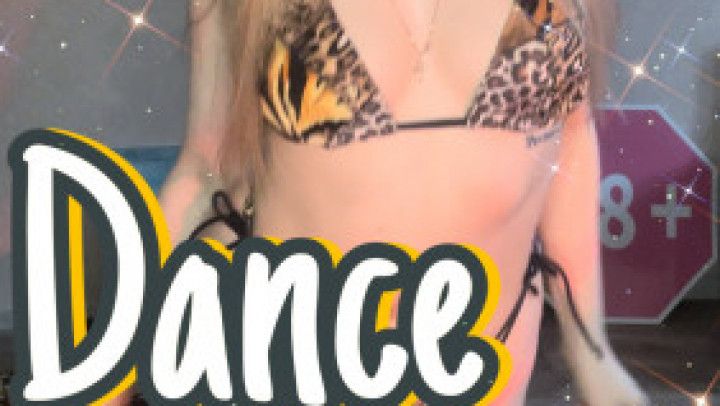 blonde girl in a swimsuit dances very hot